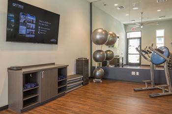 Gym with equipment and entertainment